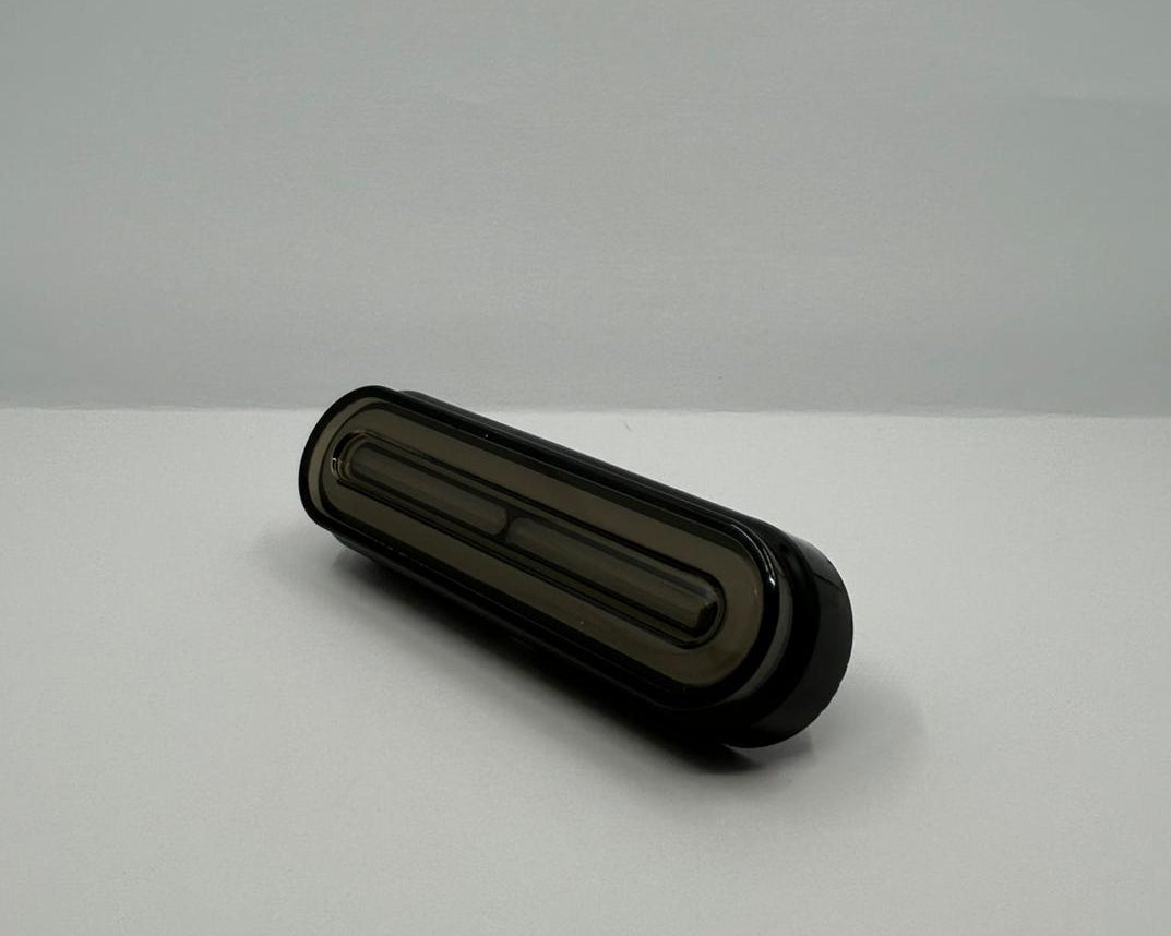 Black rectangular object on a white background